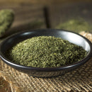 A black bowl filled with The Spice Lab Organic Whole Dill Weed, resting on burlap atop a wooden surface—perfect for infusing dishes like tzatziki with fresh, herbal flavor.