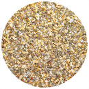 A close-up of a circular pile of The Spice Lab Sweet Basil & Garlic Seasoning by The Spice Lab, featuring a blend of coarse salt, dried garlic, onion flakes, pepper, green herbs, and sweet basil on a white background.