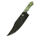 The Spaceman Knives Gravity Series Chef Knife features a large, dark blade with an intricate Damascus pattern and a green textured handle, resting on a scratched, speckled surface.