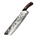 The Spaceman Knives Meteor Series Chef Knife, featuring a handcrafted 8.5" hammered stainless steel blade and a wooden handle with brass rivets, rests on a marble countertop beside a black cloth.