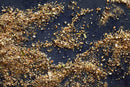 Coarse, mixed brown and yellow breadcrumbs are scattered across a dark, textured surface, with visible herb pieces—seasoned lightly with World Spice Lemon Herb Pepper by World Spice, a salt-free all-purpose blend featuring hints of citrusy lemon and aromatic herbs.