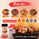Promotional image for Hickman's BBQ Sweet Natural Gluten Free BBQ Rub 9.4 oz, featuring grilled poultry, pork, seafood, and vegetables. Labeled "Best On," "Heat Level: Mild," shows the bottle and a Made in USA label.