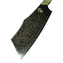 A close-up of the Spaceman Knives Gravity Series Nakiri, featuring a dark Damascus-patterned AUS-10 steel blade and a handle with green and black accents, photographed on a white background.