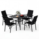 The DirectDeals 5 Pieces Patio Dining Set for 4 Outdoor Square Table and Stackable Chairs is shown with a vase of flowers, cups on a plate, and a bowl of red apples on the table, against a plain white background.