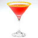 A red cocktail in a martini glass with a yellow sugar rim, created using The Spice Lab Zesty Orange Sugar Cocktail Rimmer by The Spice Lab, set against a plain white background.