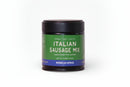A jar of World Spice Italian Sausage Mix by World Spice, featuring a green label with a black lid. The label displays the words Herbal • Heat • Earthy and notes a net weight of 3.9 oz (28g). Expertly blended with classic Italian herbs, this sausage seasoning delivers authentic flavor to your favorite dishes.