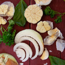 SALTOPIA Infused Sea Salts' Italian Herbs & Garlic Salt: KITCHEN'S KEEPER, featuring onion, parsley, basil, and garlic, is ideal for everyday seasoning or blending into a bold Italian herb salt.