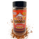 A jar of Blazing Star BBQ’s All In One Seasoning featuring a pig chef logo on the label, displayed on a white background with scattered seasoning powder. This keto-friendly, versatile blend from Blazing Star BBQ is perfect for adding bold flavor to any dish.