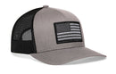 The Haka Hat American Flag Trucker Hat features a gray-black USA Tactical snapback design, mesh back, and monochrome flag patch, combining style and comfort in a classic trucker hat by Haka Hat.