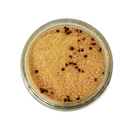 A top view of Saltopia Maple Mustard Seasoning Low Sodium: ANOTHER ONE BITES by SALTOPIA Infused Sea Salts—a light brown, grainy blend with dark seeds, offering heart-healthy flavor and reduced sodium.