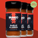 Three bottles of Bravado Spice Co Garlic & Árbol Seasoning from Bravado Spice Co are lined up, with a green “Most Popular” badge in the top right corner on a red background—perfect as a bold Tex-Mex seasoning for your favorite dishes.