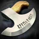 The Texan Knives Axe Pizza Cutter, custom hand-engraved with a polished J2 steel blade and a smooth striped wooden handle, rests on dark leather.