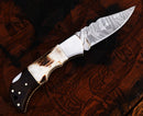 The Texan Knives Personalized Damascus Steel Pocket Knife features a patterned blade and custom handle, making it a perfect Custom Valentines Day Gift Knife for your husband.