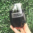 Wine Decanter - The Script stemless wine glass filled with red wine, featuring the name HANRATTY etched in a decorative rectangular border as part of a personalized wine glasses set.