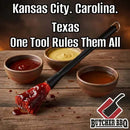 Three bowls of barbecue sauce and the Butcher BBQ Mop Brush with silicone bristles are arranged on wood. Text above reads: Kansas City. Carolina. Texas. One Tool Rules Them All.