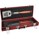 The JDS Industries 3-Piece Rosewood BBQ Tool Gift Set features a spatula, tongs, and fork with wooden handles in a wooden case with metal clasps, elegantly displayed against a white background.