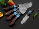The Texan Knives Best Chef Knives Set features a 13" handmade Damascus steel kitchen knife with a wenge resin handle and leather sheath, displayed on a black surface among green and orange peppers.