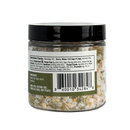 A clear plastic jar of B.T. Leigh’s Garlic & Rosemary Finishing Salt featuring a nutrition facts label and barcode on the side.