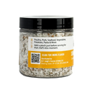 Clear plastic jar of B.T. Leigh’s Thyme & Lemon Finishing Salt, featuring a label with serving suggestions and a QR code.