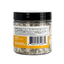 A plastic jar of B.T. Leigh’s Thyme & Lemon Finishing Salt showing the nutrition facts label, ingredient list, and barcode.