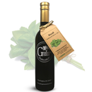 A black bottle of Georgetown Olive Oil Co. BASIL Infused | High Polyphenols Extra Virgin Olive Oil, featuring a tan tag with a basil leaf image and text, is displayed in front of fresh basil leaves and showcases the Georgetown Olive Oil Co. logo. This high polyphenol extra virgin olive oil delivers robust flavor and health benefits, making it an outstanding addition to your kitchen.