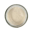 Top view of a 16oz jar of SALTOPIA Infused Sea Salts’ Vanilla Bean Sugar: BEAN GOOD, showcasing fine, light beige sugar against a white background.