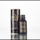 A bottle and cylindrical container of The Immaculate Beard’s Immaculate Fast Absorbing Beard Oil For Men Softens Skin are displayed side by side on a white background, highlighting this premium beard oil designed for ultimate conditioning and skin softening.