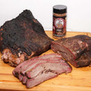 Cattleman's Brand Brisket & Steak Seasoning – Texas-made BBQ rub in 16 oz. bottle shown on brisket. 