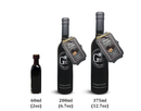 Three sleek black bottles of varying sizes—60ml, 200ml, and 375ml—stand out against a crisp white background. The two larger bottles display tags reading "Black Truffle," signifying that they contain Georgetown Olive Oil Co. BLACK TRUFFLE INFUSED Balsamic Vinegar, barrel aged in Modena, Italy. Ideal for gourmet kitchens, these bottles embody the rich essence of authentic Italian black truffle-infused vinegar from Georgetown Olive Oil Co.
