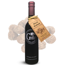 A dark glass bottle labeled Georgetown Olive Oil Co. BLACK WALNUT Balsamic Vinegar, with a tag and walnuts in the background, highlights a barrel-aged balsamic vinegar from Modena, Italy, crafted by Georgetown Olive Oil Co. and inspired by the rich flavors of black walnut.