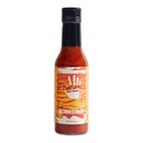 A 5-ounce bottle of Culture Hot Sauce Blindsided by Culture Hot Sauce, featuring a bold Carolina Reaper hot sauce with a red hue and an abstract label in yellow, orange, and white.