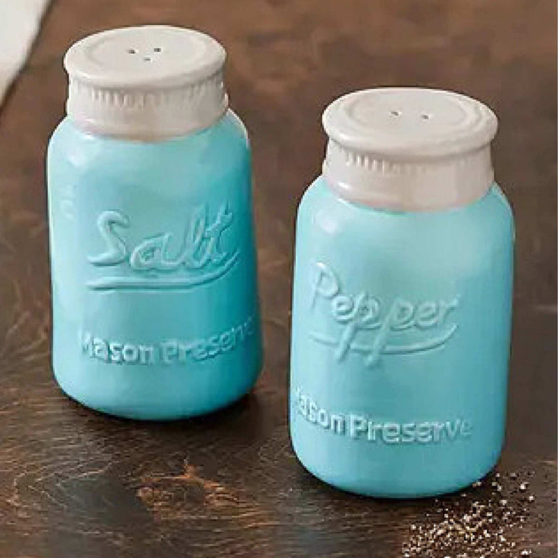 Blue ceramic Mason jar salt and pepper shakers with vintage farmhouse design
