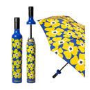 The Vinrella Nikki on Blue Bottle Umbrella features a stylish blue handle and matching case, both adorned with a vibrant blue and yellow floral pattern. This compact, no-drip umbrella is eye-catching and perfect for on-the-go use.