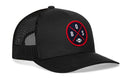 The Haka Hat Boston Trucker Hat is a black snapback featuring a round red and blue front patch with crossed lines, B, O, S letters, and a football icon. Classic mesh design for comfort. Brand: Haka Hat.