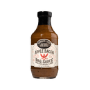 A 20 oz (567g) bottle of Brownwood Farms Apple Bacon BBQ Sauce from Brownwood Farms, featuring a white label with red and black text, black cap, and decorative accents. Made with real apple purée and a touch of hickory smoke, this sauce delivers rich apple bacon flavor.