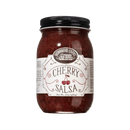 A glass jar of Brownwood Farms Cherry Salsa with a black lid, filled with rich, deep red salsa. The white label displays the Brownwood Farms brand name, an illustration of cherries, and product details, emphasizing this distinctive cherry fruit salsa.