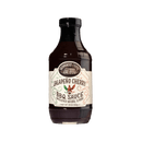 A bottle of Brownwood Farms Jalapeno Cherry BBQ Sauce, with a beige label adorned with red and green accents and text, is showcased against a plain white background—an ideal choice for those seeking a sweet and spicy BBQ flavor adventure.