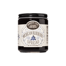 A 10 oz jar of Brownwood Farms Michigan Blueberry Spread, featuring a cream and blue label with a blueberry illustration and the Brownwood Farms logo, displayed on a white background. Made with ripe Michigan blueberries, this flavorful fruit spread delivers the perfect balance of sweet and tart in every serving.