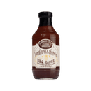 A bottle of Brownwood Farms Pineapple Mango BBQ Sauce, featuring a cream label with brown and gold text on a clear plastic bottle filled with reddish-brown sauce. The sweet heat of chipotle pepper makes this pineapple mango BBQ sauce from Brownwood Farms an irresistible choice for tropical-style fish tacos.