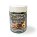 A clear 6 oz jar of SALTOPIA Infused Sea Salts labeled "Saltopia Smoky Blended Salt: BURGER BUDDY" with a white lid. The label shows a burger and herbs. Made with smoked alderwood sea salt, perfect as a versatile seasoning.