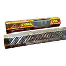 The Butcher BBQ Premium Pellet Smoke Tube 12" by Butcher BBQ, featuring a hexagonal design and perforated holes, is displayed before its "Smoke Tube" packaging on wood—a key grill accessory for infusing rich wood smoke flavor into your food.