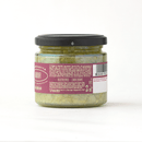 A glass jar of Famiglia Crispino Artichoke Bruschetta Spread — Marinated Italian Carciofi by Taycte, with a black lid and pink-white label, is displayed on a white surface against a plain white background.