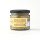A glass jar of Famiglia Crispino Porcini Mushroom Bruschetta Spread — Wild Italian Funghi by Taycte features a black lid, is Gluten Free and 100% Vegan, and is shown on a white background—ideal for Calabrian bruschetta.