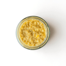 A glass jar of Famiglia Crispino Porcini Mushroom Bruschetta Spread — Wild Italian Funghi from Taycte, filled with chunky mushroom spread, photographed from above on a white background.