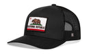 The Haka Hat California Flag Trucker Hat is a black snapback with mesh back, featuring a front patch of the bear, red star, and text from the California Republic flag.
