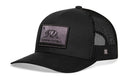 The Haka Hat California Flag Trucker Hat is a black tactical snapback with mesh panels, a curved brim, and a patch featuring an embroidered bear and star—reflecting the California flag—with "Underground" on the structured crown.