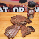 Cattleman's Brand Brisket & Steak Seasoning – Texas-made BBQ rub in 16 oz. bottle shown on meat