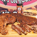Cattleman's Brand Pork & More Seasoning – Texas-made rub for pork, chicken, and more in 16 oz. bottle. Pictured with ribs. 