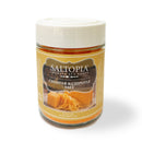 A jar from the SALTOPIA Cheese Lovers Gift Set by SALTOPIA Infused Sea Salts features a beige label reading “Cheddar & Chipotle Salt,” cheddar and grated cheese images, a white lid, and vibrant orange gourmet seasoning salt inside.