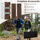 Two hikers walk in a forest. Above them, the DirectDeals Folding Camping Table with 2-Tier Open Shelves for Outdoor BBQ showcases its sturdy build, organized storage, folding design, and portability.